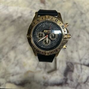 Gold and Black Watch with Rhinestone Dial